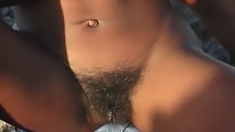 African American Woman Has A Pleasant Time Outdoors In Public