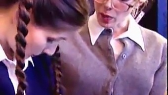 Old And Young Lesbians Indulge In Steamy Classroom Encounter